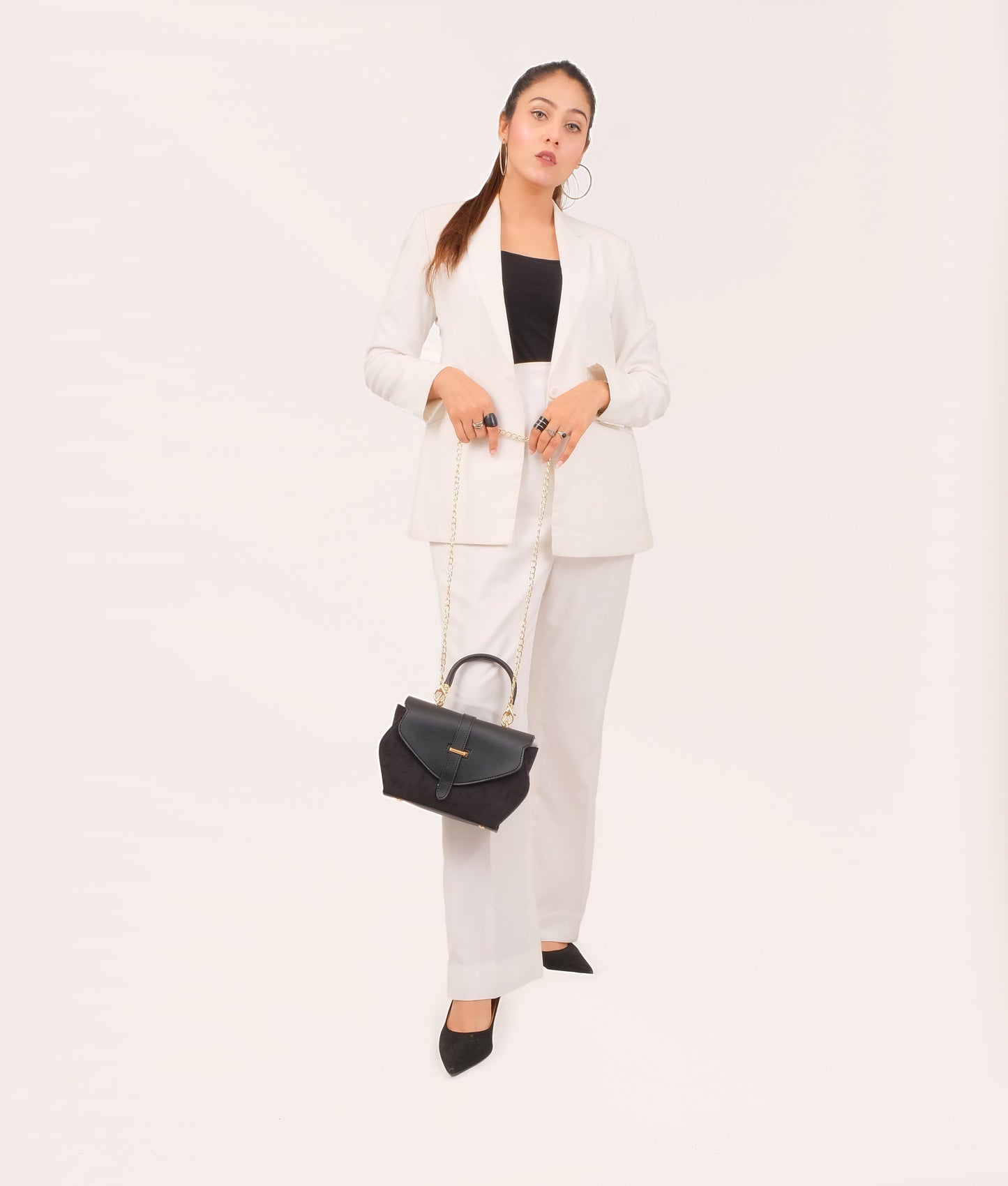 Black top-handle hexagon bag